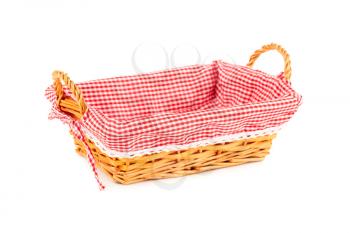 The empty wicker basket isolated on white background.