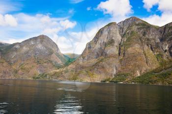 Landscape with Naeroyfjord and high mountains in Norway.