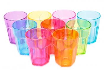 Colorful plastic glasses isolated on white background.