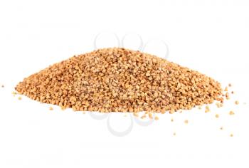 The heap of buckwheat isolated on white background.