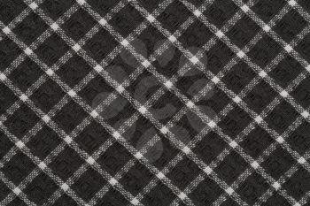 Black and white kitchen towel texture as a background, horizontal picture.