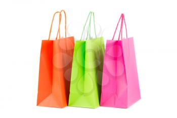Colorful paper shopping bags isolated on white background.