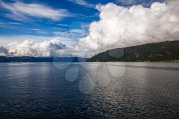 Landscape with fjord and mountains in Norway.