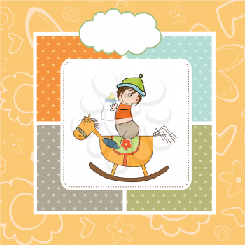 Royalty Free Clipart Image of a Baby Boy on a Rocking Horse