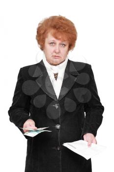 Senior lady standing with apartament rent bill and money. Isolated over white.