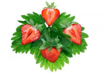 A heap of fresh strawberries on green foliage . Isolated