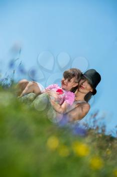 mother and daughter hugging