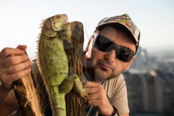 portrait of the young man with the iguana