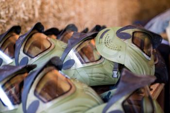 Paintball masks in a row