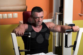 Weightlifter on Exercise Machine