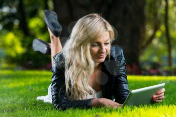 Young Woman Using Tablet Notebook