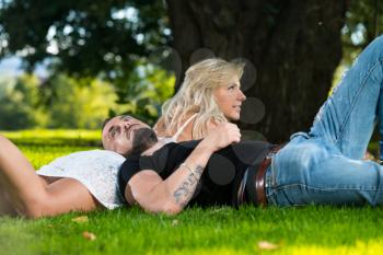 Cheerful couple enjoying in the nature