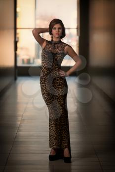 Model Wearing A Dress With Animal Print