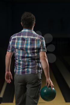 Bowler Poised With His Ball