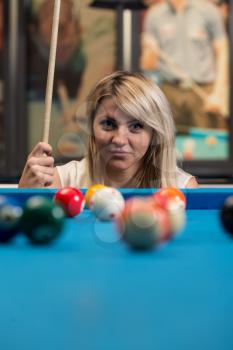 Young Women Concentrate On Ball