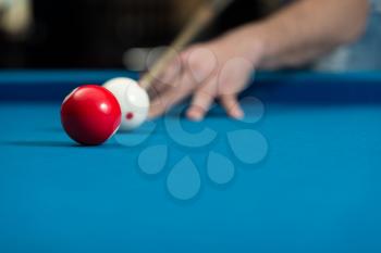 Close-Up Of A White Ball Waiting To Shoot