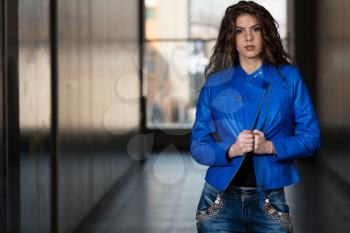 Glamour Fashion Model Wearing Blue Leather Jacket