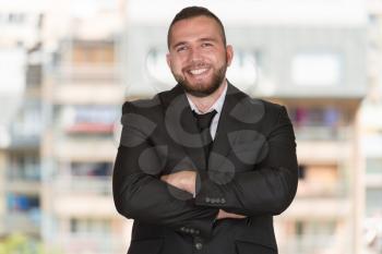 Portrait Of Young Construction Manager With Arms Crossed