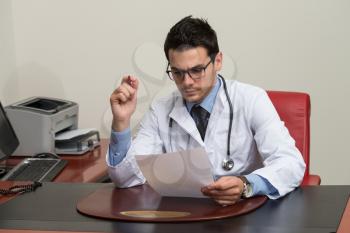 Doctor Writing A Letter - Notes Or Signing A Document Or Agreement