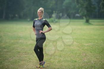 Portrait Of Young Woman Doing Outdoor Activity Running