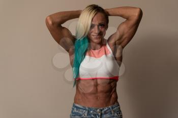 Strong Middle Aged Woman Bodybuilder With Six Pack