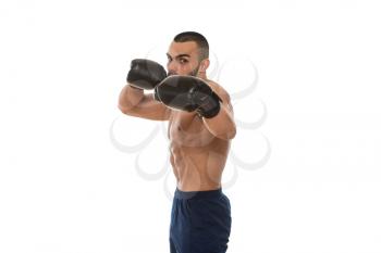 Young Muscular Sports Guy In Gloves With A Naked Torso Boxing - Isolated On White Background