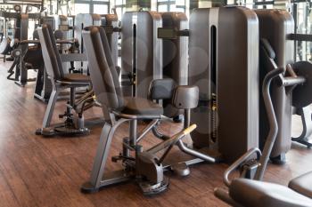 Equipment And Machines At The Modern Gym Room Fitness Center