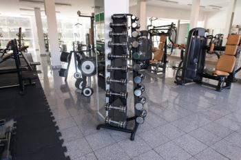 Modern Gym Room Fitness Center With Equipment And Machines