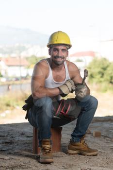 Construction Worker Relaxing The Fresh Air During Work