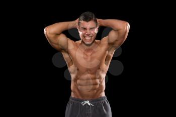 Young Bodybuilder Flexing Muscles - Isolate On Black Blackground - Copy Space