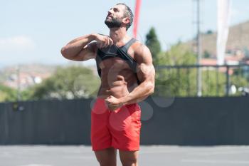 Portrait Of A Physically Fit Young Man Posing Outdoors