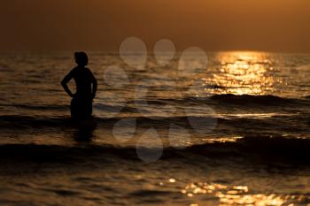 Sexy Girl Silhouette On The Beach At Sunset Over The Sea - Copy Space Text