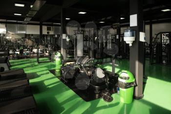 Modern Gym Room Fitness Center With Equipment And Machines