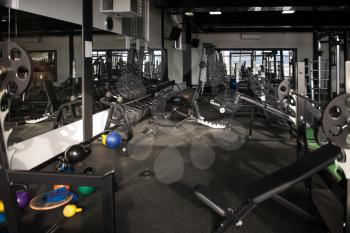 Equipment And Machines At The Modern Gym Room Fitness Center