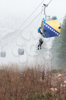 Trebevicka Zicara, Sarajevo, Bosnia and Herzegovina - April 05 2018: Exercise on Gondola Lift Car - Alpinist Is Rescue People From Gondola That Are Stuck