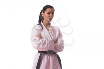 Young Muslim Woman In Traditional Kimono Practicing Her Karate Moves - Isolated On White Background