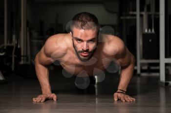 Young Model Doing Push Ups As Part Of Bodybuilding Training