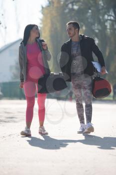 Portrait Of A Sexy Couplein in City Park Area - Training and Exercising for Endurance - Healthy Lifestyle Concept Outdoor