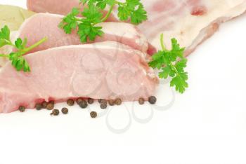 Pieces of crude meat with parsley and fennel