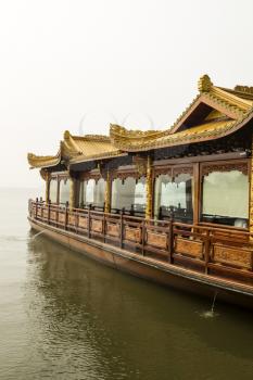 Large Asian boat on West Lake in Hangzhou China