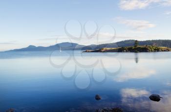 Horizontal photo of Orcas Island harbor within the San Juan Islands during summer evening
