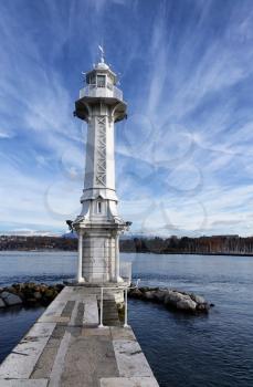 Vertical image of lighthouse on Lake Geneva, Switzerland, on nice autumn day 