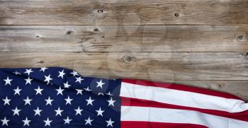 Flay lay view of USA flag on rustic wooden boards horizontal format