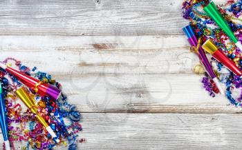 New Year party decorations on rustic wood in flat lay view