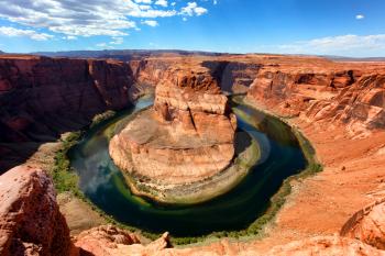 Horseshoe bend on the Colorado River in late summer season 