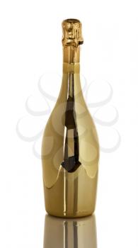 Happy New Year with a Golden champagne bottle isolated on white background with reflection
