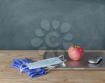 Back to school concept with modern technology and personal protection equipment for Covid-19 pandemic 