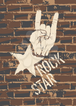 Rock Star Sign With Horns Gesture On Brick Wall