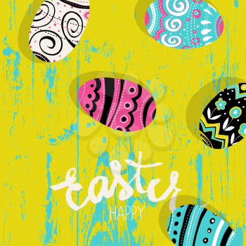 Easter eggs on wooden board.  Happy Easter greetings card. Bright colors.