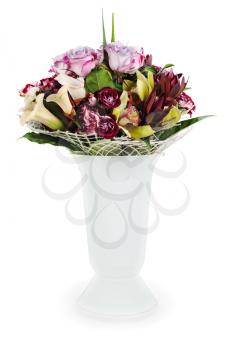 colorful floral bouquet of roses, lilies and orchids arrangement centerpiece in vase isolated on white background